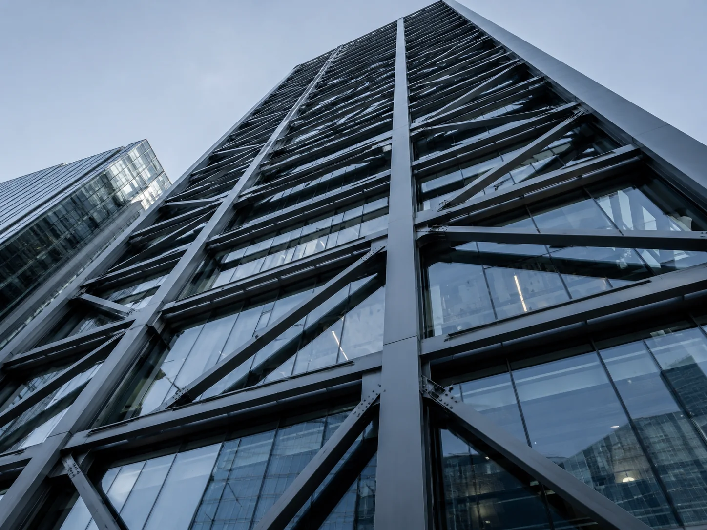 Exposed structural steel rising through a Canadian city